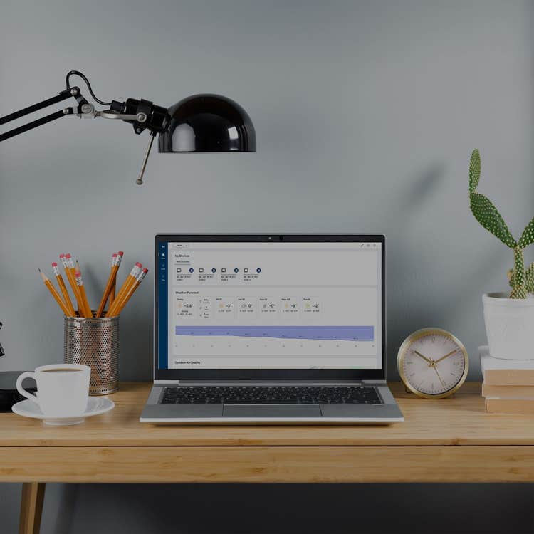 desk-with-laptop-showing-ion-smarthome-mb